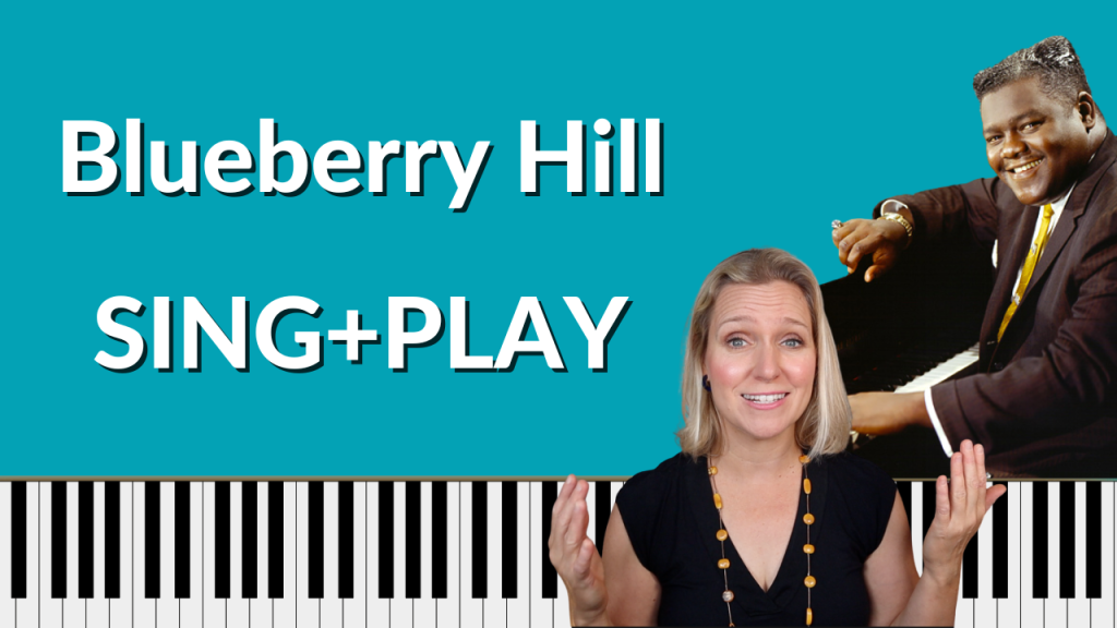 Turquoise background with photo of Fats Domino. Piano keyboard at the bottom of the thumbnail. Photo of Brenda Earle Stokes smiling with her hands up. White letters read "Blueberry Hill SING+PLAY"